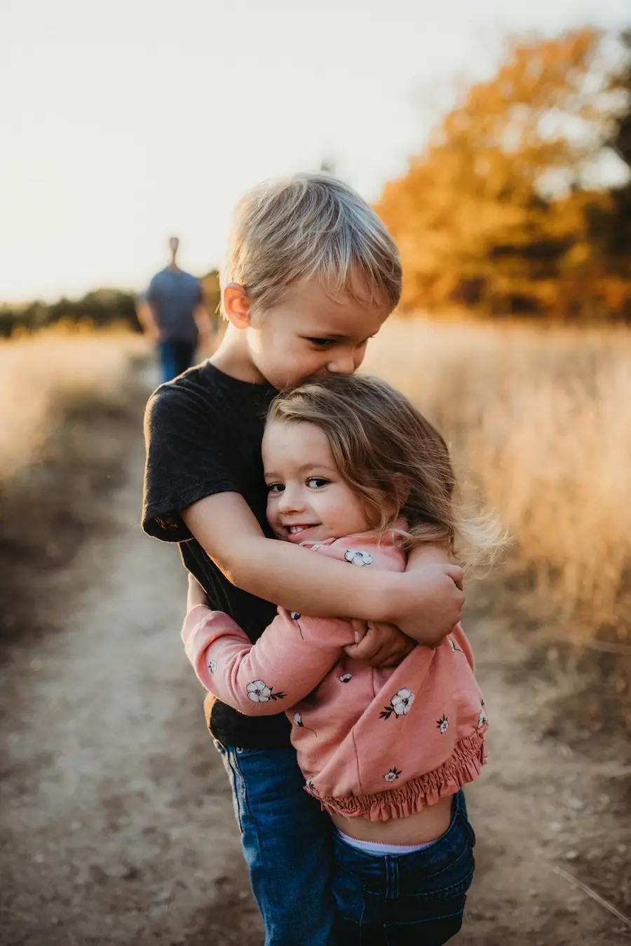 two kids hugging